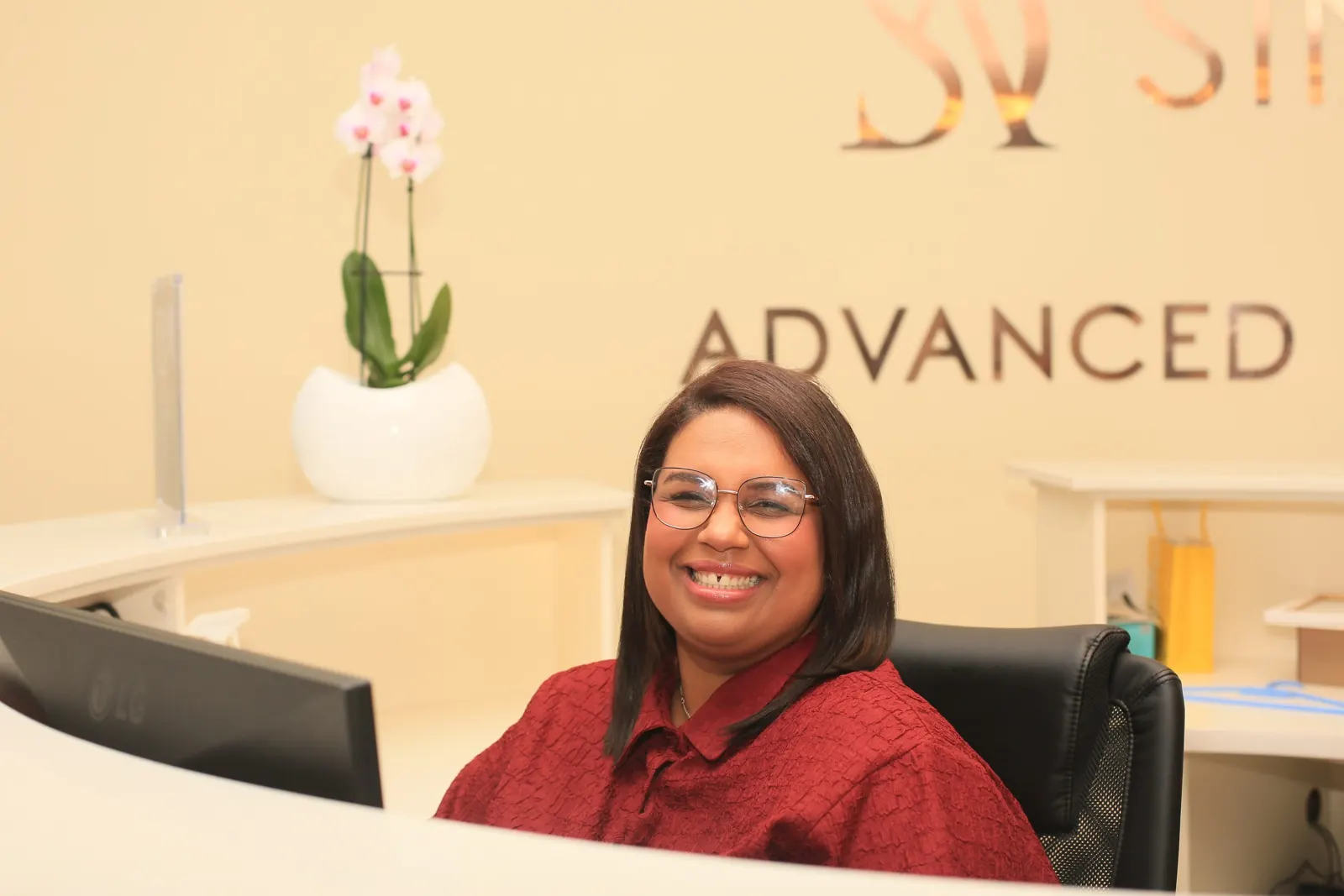 Smiling team member at the front desk